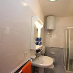 Апартаменты Coastal With Shared Pool